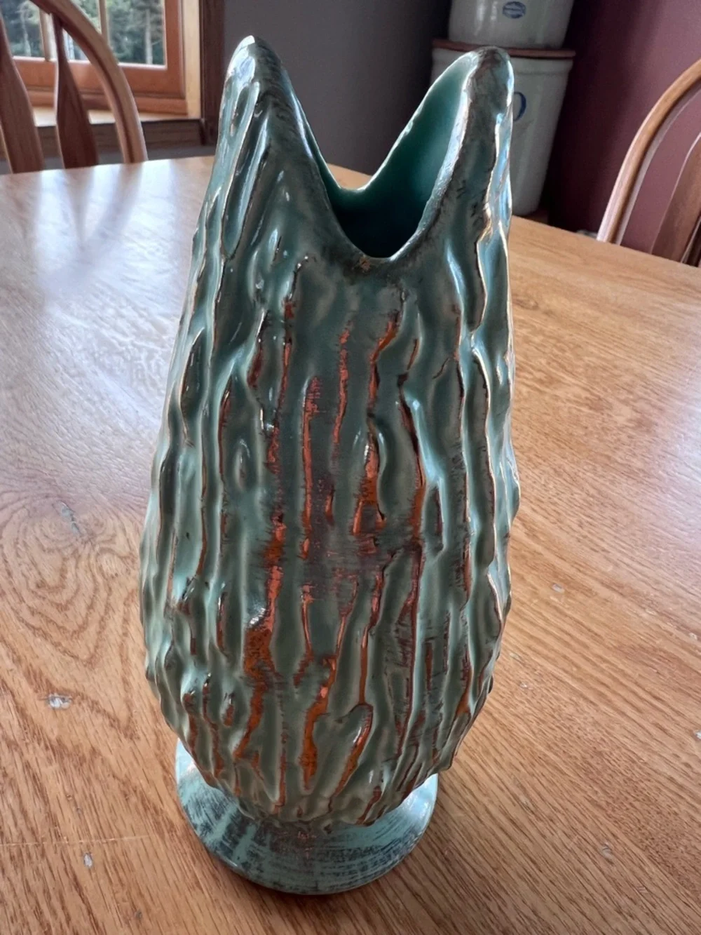Turquoise/ Blue with Gold accents-textured bark like ceramic vase.